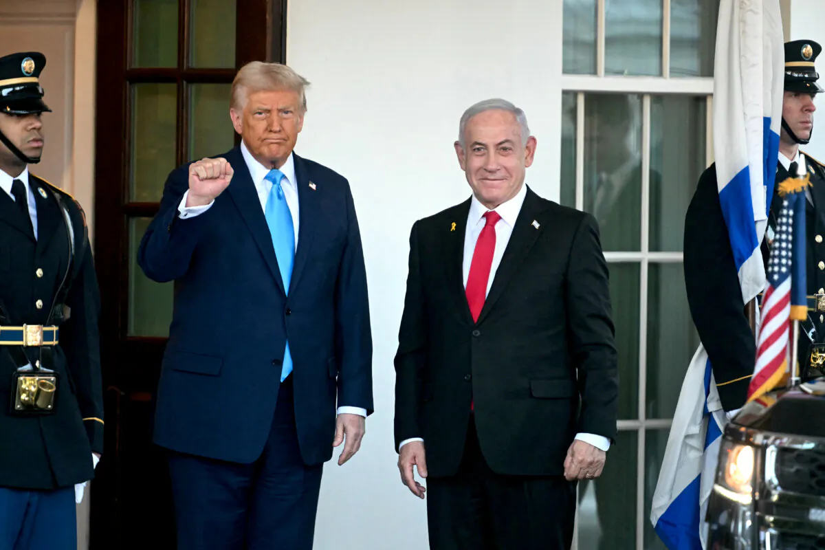President Donald Trump greets Israel's Prime Minister Benjamin Netanyahu (R) as he arrives at the North Portico of the White House on Feb. 4, 2025. (Jim Watson/AFP via Getty Images)
