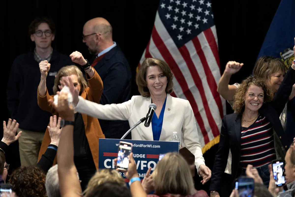 Dane County Circuit Court Judge Susan Crawford (C) reacts with supporters after her victory in the race for Wisconsin Supreme Court justice during an election night event in Madison, Wis., on April 1, 2025. (Scott Olson/Getty Images)