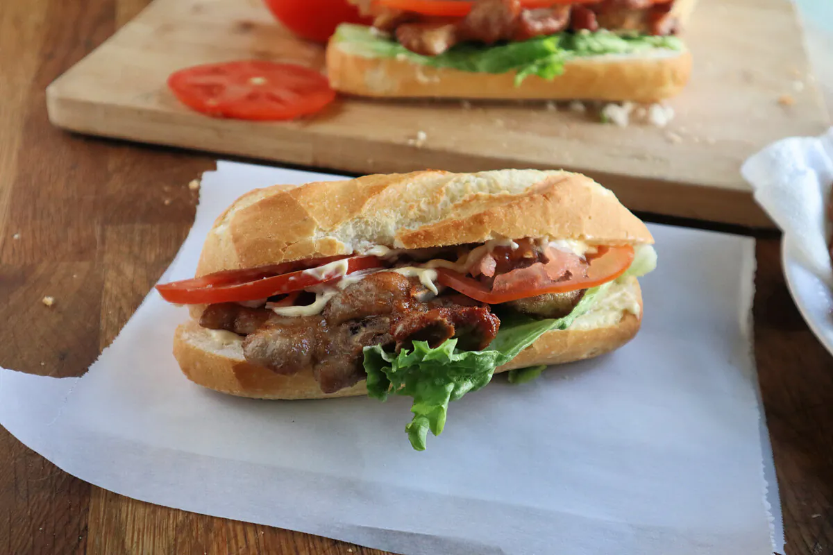 In Hong Kong, fried pork sandwiches are traditionally made with the chop bone in. (Gretchen McKay/Pittsburgh Post-Gazette/TNS)