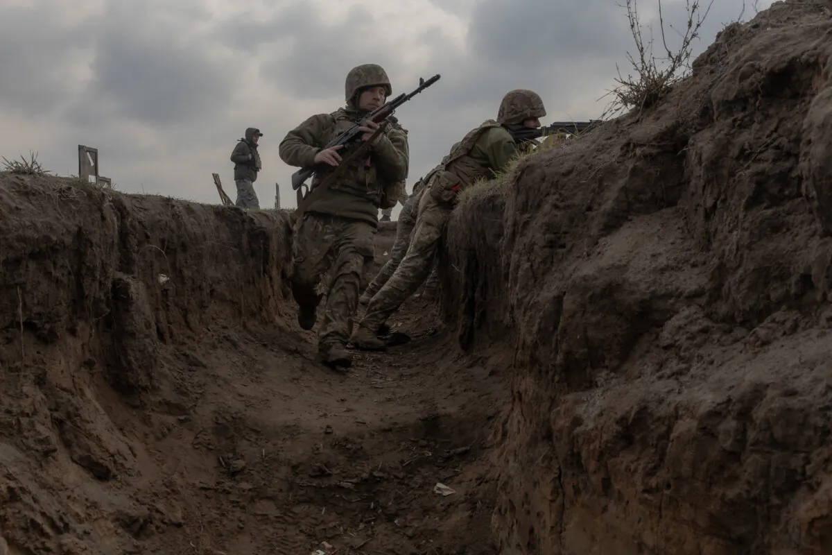 Members of the 24th Mechanized Brigade of the Ukrainian Military take part in a trench field training exercise in an undisclosed location in eastern Ukraine on March 18, 2025. (ROMAN PILIPEY/AFP via Getty Images)