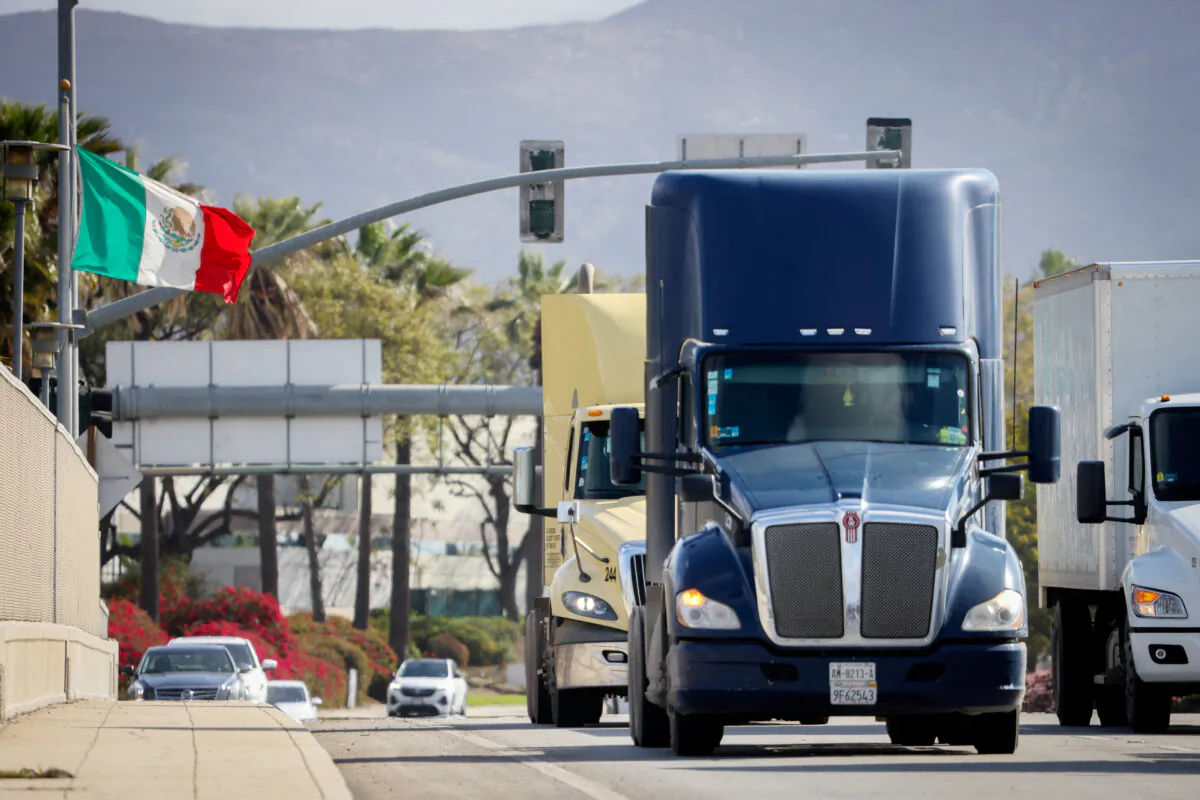 Trucks entering the United States from Mexico head for an inspection station after crossing the border in Otay Mesa, Calif., on April 1, 2025. (Sandy Huffaker/AFP via Getty Images)