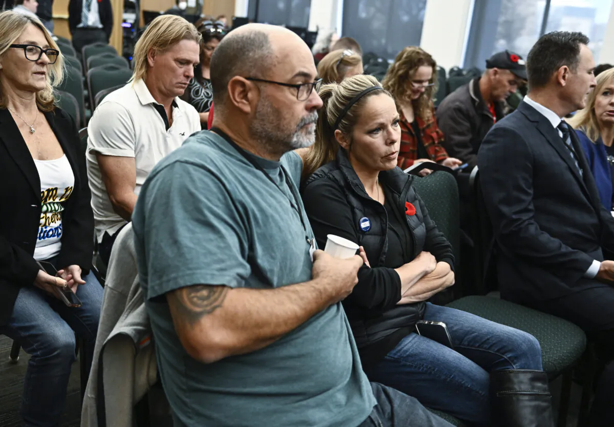 Freedom Convoy organizers Chris Barber and Tamara Lich sit in the gallery as they wait for the start of the day's hearings at the Public Order Emergency Commission, where they were to appear as witnesses, in Ottawa on Nov. 2, 2022. (The Canadian Press/Justin Tang)