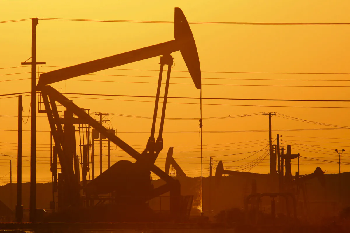 Pump jacks used for gas and oil extraction are seen over the Monterey Shale formation in Lost Hills, Calif., on March 24, 2014. (David McNew/Getty Images) 