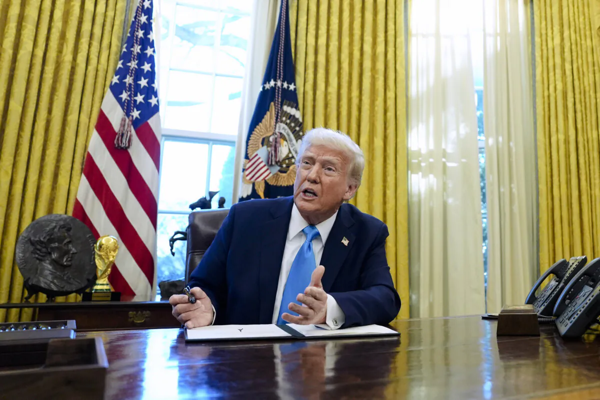 President Donald Trump speaks to reporters as he signs executive orders in the White House on Feb. 4, 2025. (Evan Vucci/AP Photo)