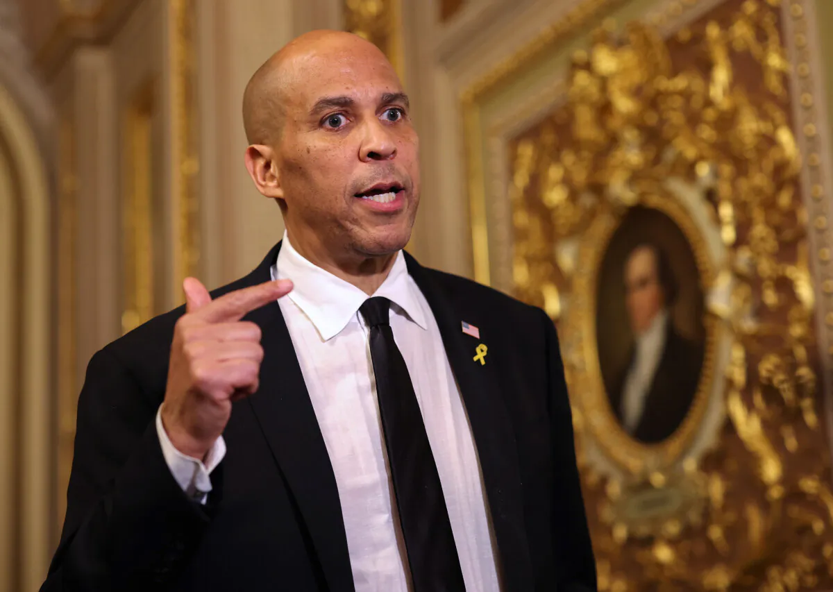 U.S. Sen. Cory Booker (D-N.J.) speaks to reporters as he leaves the Senate Chamber after delivering a record-setting floor speech at the Capitol in Washington on April 1, 2025. (Tasos Katopodis/Getty Images)