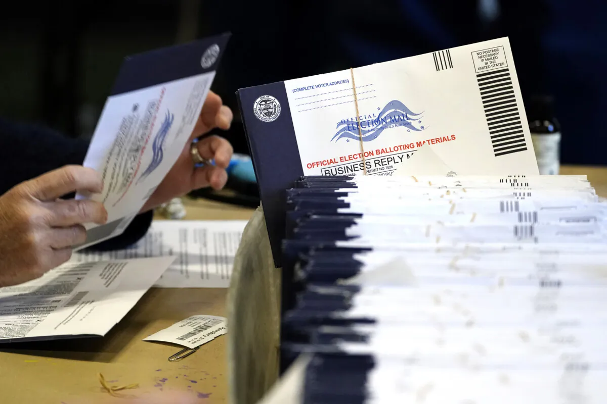 Election workers process mail-in and absentee ballots at West Chester University in West Chester, Pa., on Nov. 4, 2020. (Matt Slocum/AP Photo)