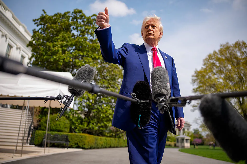 President Donald Trump gestures to members of the media before boarding Marine One on the South Lawn of the White House on April 3, 2025 in Washington, DC. (Andrew Harnik/Getty Images)