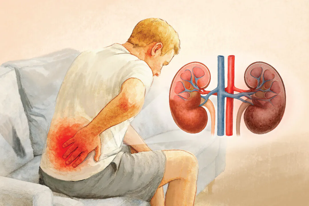 Pain in the lower back or sides is common with kidney infections or stones—both potential causes of uremia. (The Epoch Times/Shutterstock)