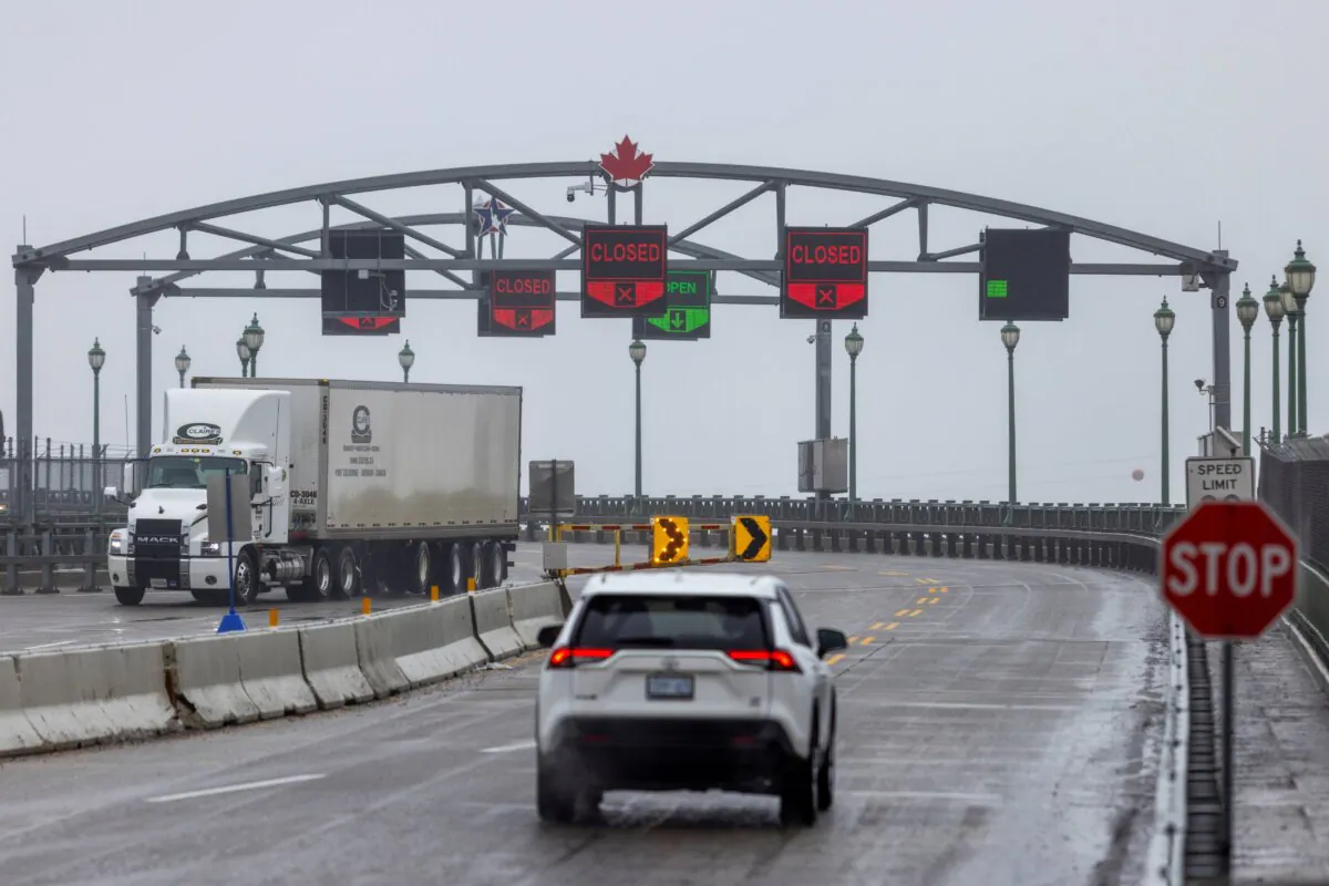 Vehicles drive across the Peace Bridge between the United States and Canada, in Buffalo, N.Y., on Feb. 27, 2025. (AP Photo/Lauren Petracca) 
