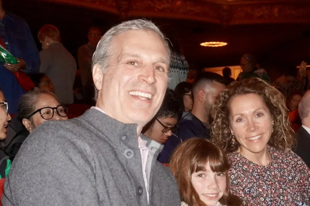 Chris and Lisa Ethenesie and their daughter attended Shen Yun Performing Arts at the Boch Center's Wang Theatre on April 5, 2025. (Mary Man/The Epoch Times)