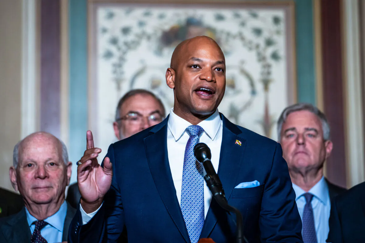 Maryland Gov. Wes Moore (C) and lawmakers speak during a press conference about rebuilding the Francis Scott Key Bridge at the U.S. Capitol in Washington on April 9, 2024. (Madalina Vasiliu/The Epoch Times)