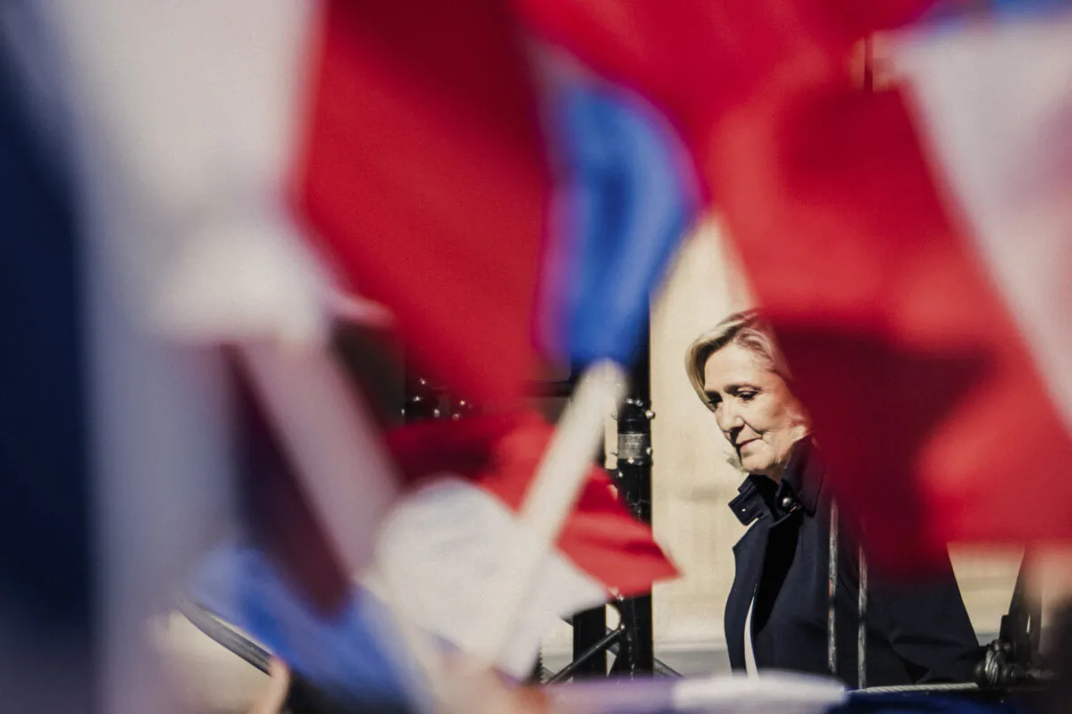 Marine Le Pen, of the National Rally party, arrives on stage during a rally in Paris on April 6, 2025. (Bastien Ohie/Hans Lucas/AFP via Getty Images)