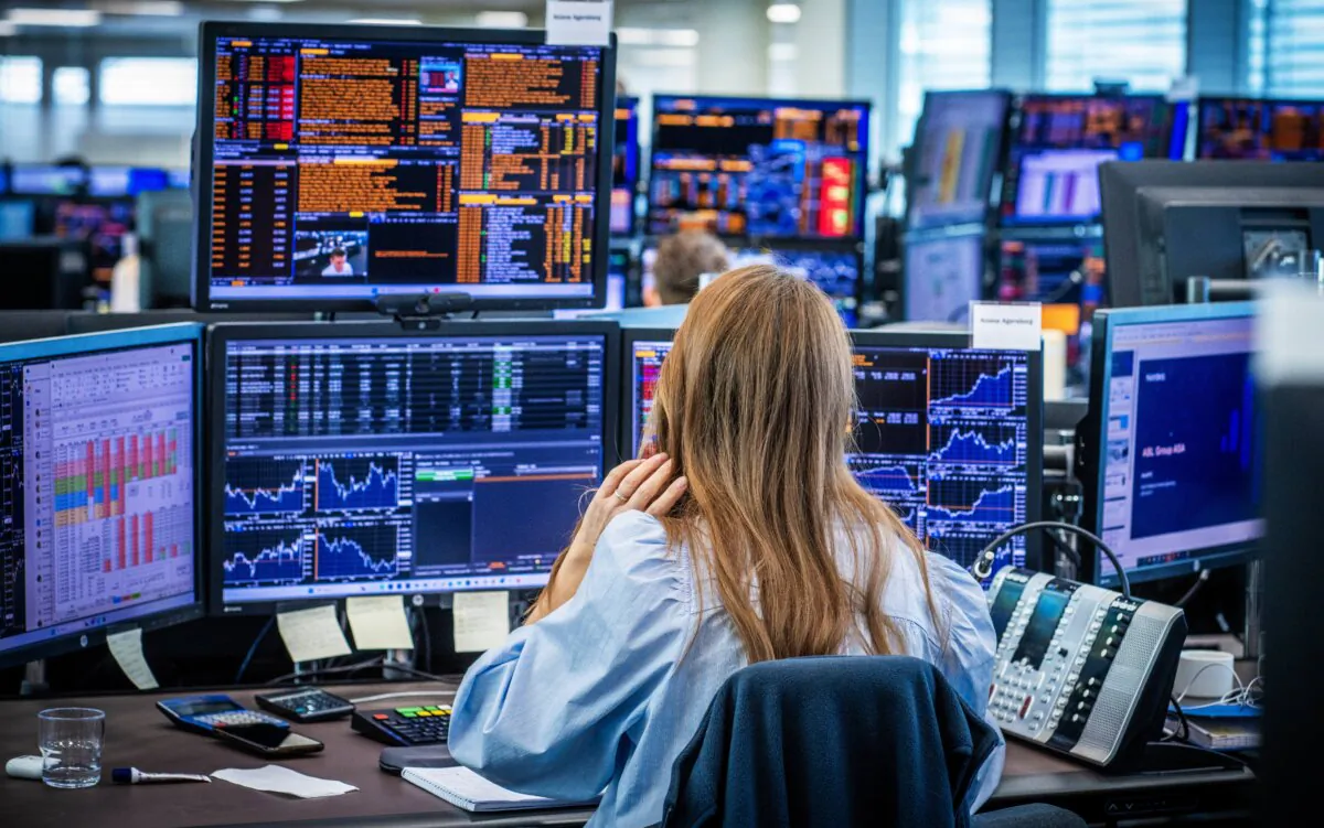 Employees in the trading room of Nordea Markets follow the turmoil and sharp stock market declines following the tariffs that are affecting markets worldwide, in Oslo, Norway, on April 7, 2025. (Ole Berg-Rusten/NTB/AFP via Getty Images)