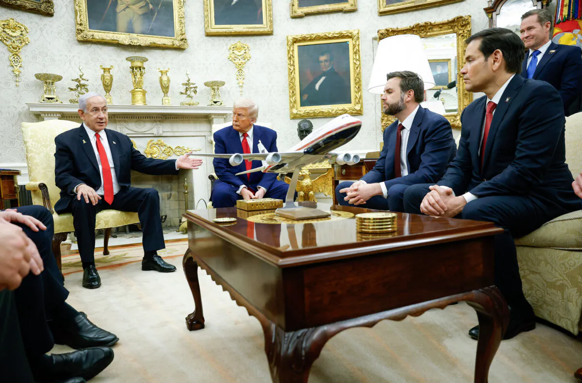 Israeli Prime Minister Benjamin Netanyahu speaks alongside President Donald Trump, with a model of Air Force One on the table, during a meeting in the Oval Office of the White House in Washington, DC, on April 7, 2025. (Kevin Dietsch/Getty Images)