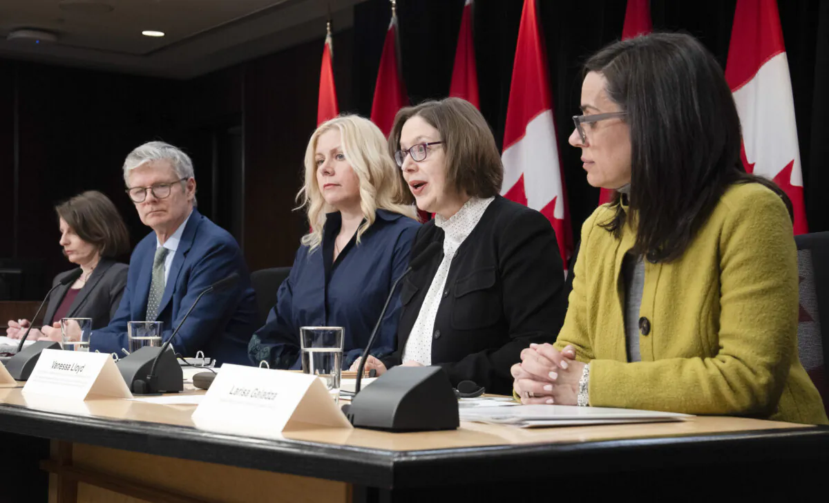 CSIS Deputy Director, Operations, and Chair of the Security and Intelligence Threats to Elections Task Force Vanessa Lloyd (second from right), speaks during a news conference in Ottawa on March 24, 2025. (The Canadian Press/Adrian Wyld)