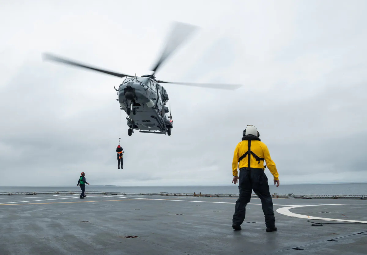 An NH90 helicopter conducts training for aircrew on board the HMNZS Canterbury. The Navy's maritime helicopters are slated for replacement under the New Zealand government's 2025 Defence Capability Plan. (Courtesy of New Zealand Defence Force)