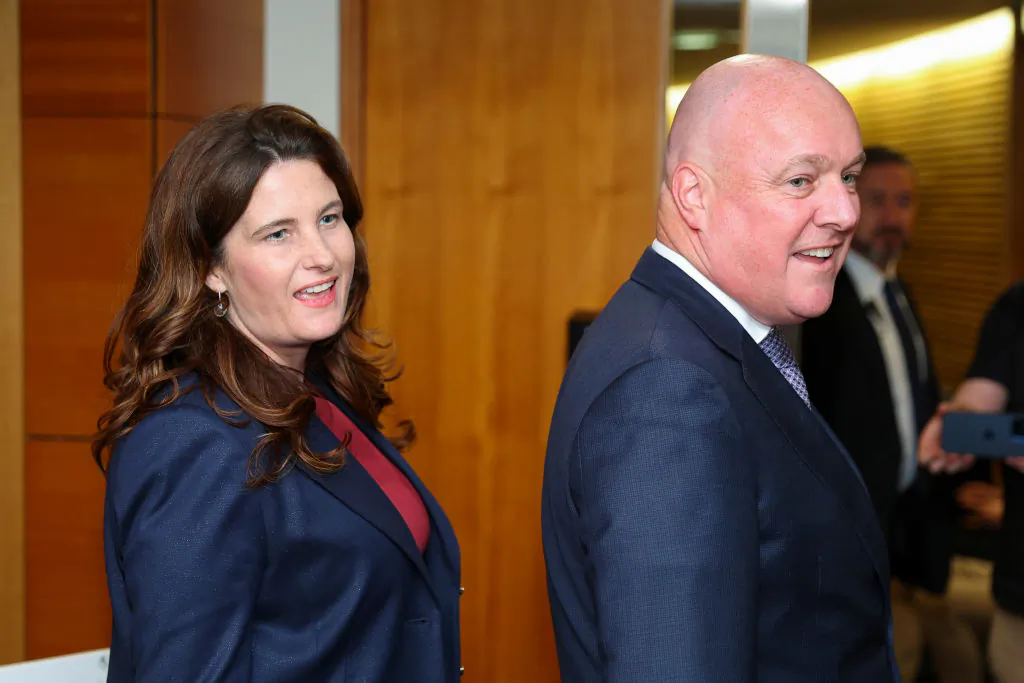 New Zealand Prime Minister Christopher Luxon and Finance Minister Nicola Willis look on prior to a press conference at Parliament in Wellington, New Zealand on Nov. 27, 2024. (Hagen Hopkins/Getty Images)