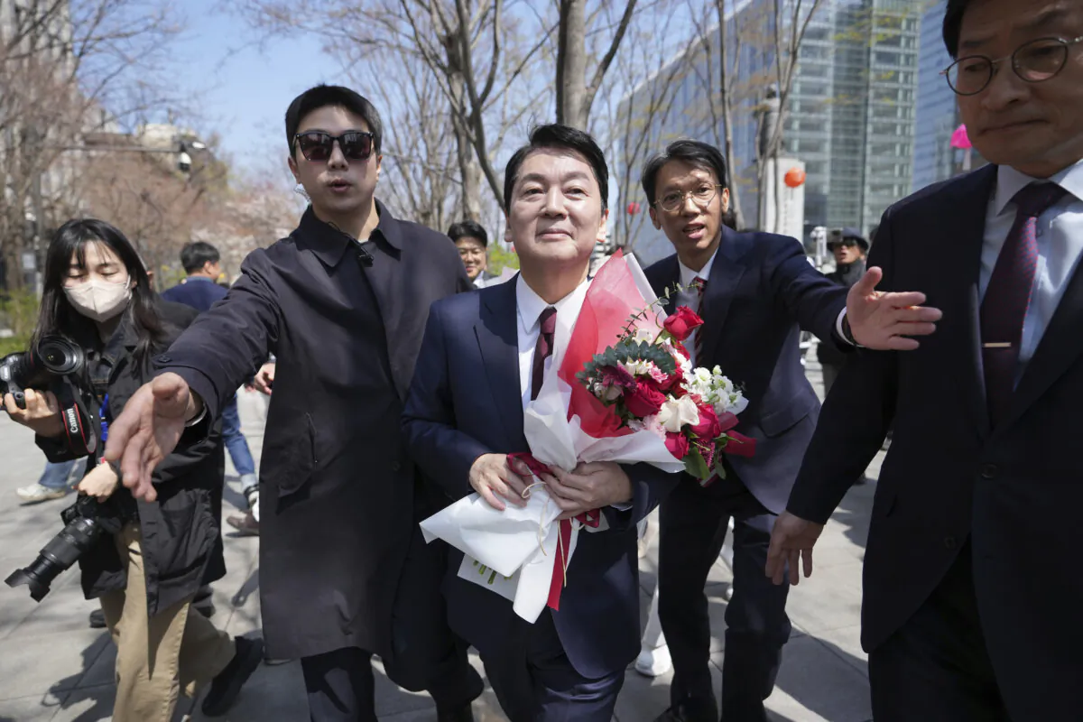 People Power Party lawmaker Ahn Cheol-soo, (C), leaves a press conference after announcing his candidacy in the presidential election in Seoul, South Korea, on April 8, 2025. (Lee Jin-man/AP)