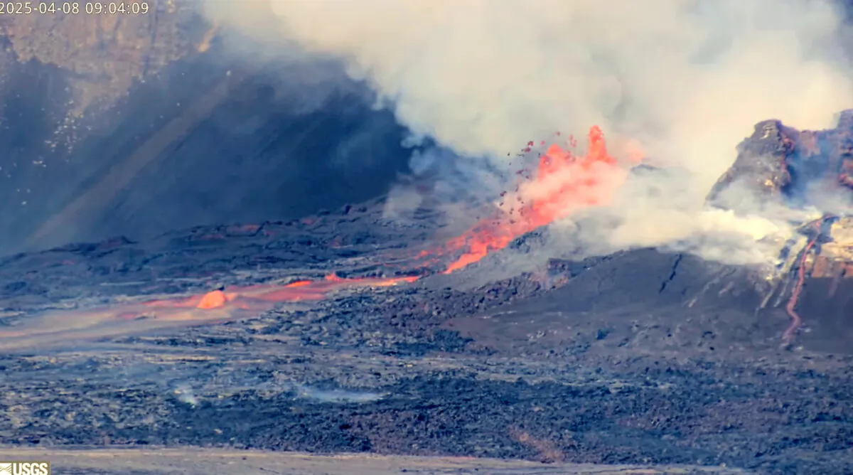 Lava shoots up high during an ongoing eruption of Kilauea volcano inside Hawaii Volcanoes National Park on April 8, 2025, in a still from webcam footage. (U.S. Geological Survey via AP)