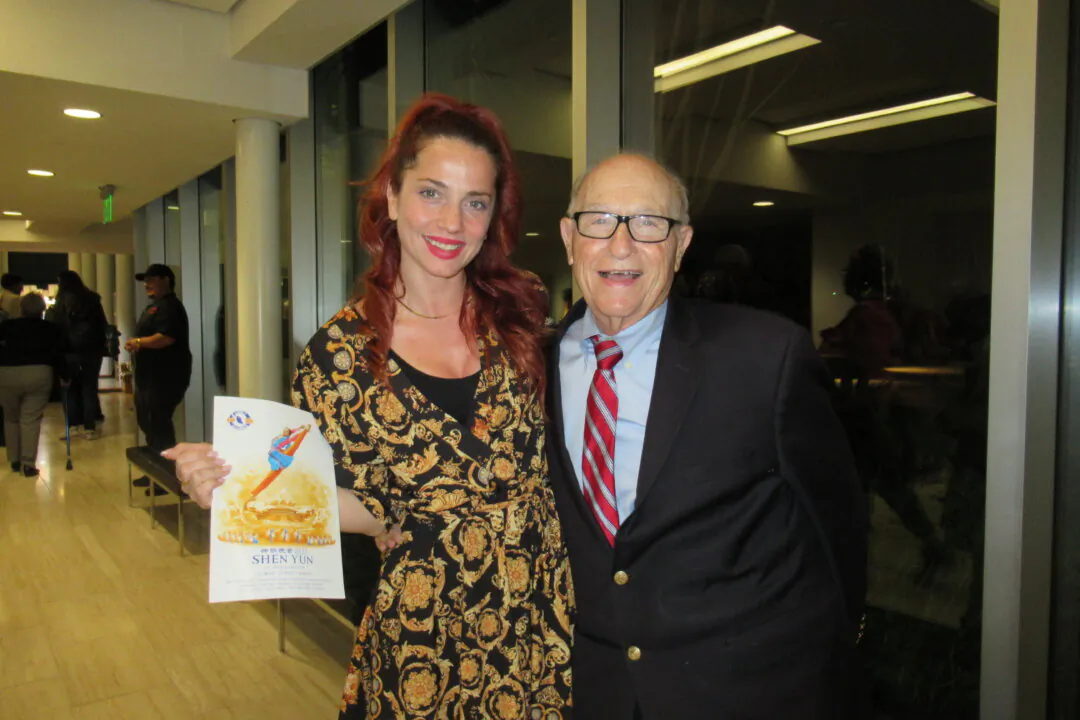 Dr. Michael Patzakis (R) and Violetta Kontodaimon watched Shen Yun at the Younes and Soraya Nazarian Center for the Performing Arts on April 8, 2025. (Linda Jiang/The Epoch Times) 