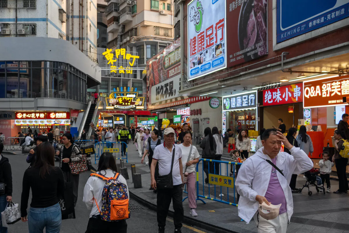Shoppers walk on a street in a shopping district in Shenzhen, China, on April 3, 2025. (Getty Images)