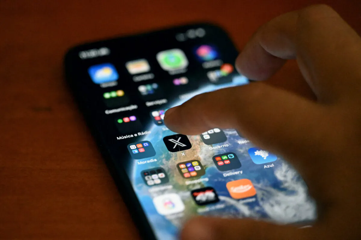 This photo illustration shows the social media platform X (former Twitter) app on a smartphone in Rio de Janeiro, Brazil, on Sept. 18, 2024. (Mauro Pimentel/AFP via Getty Images)