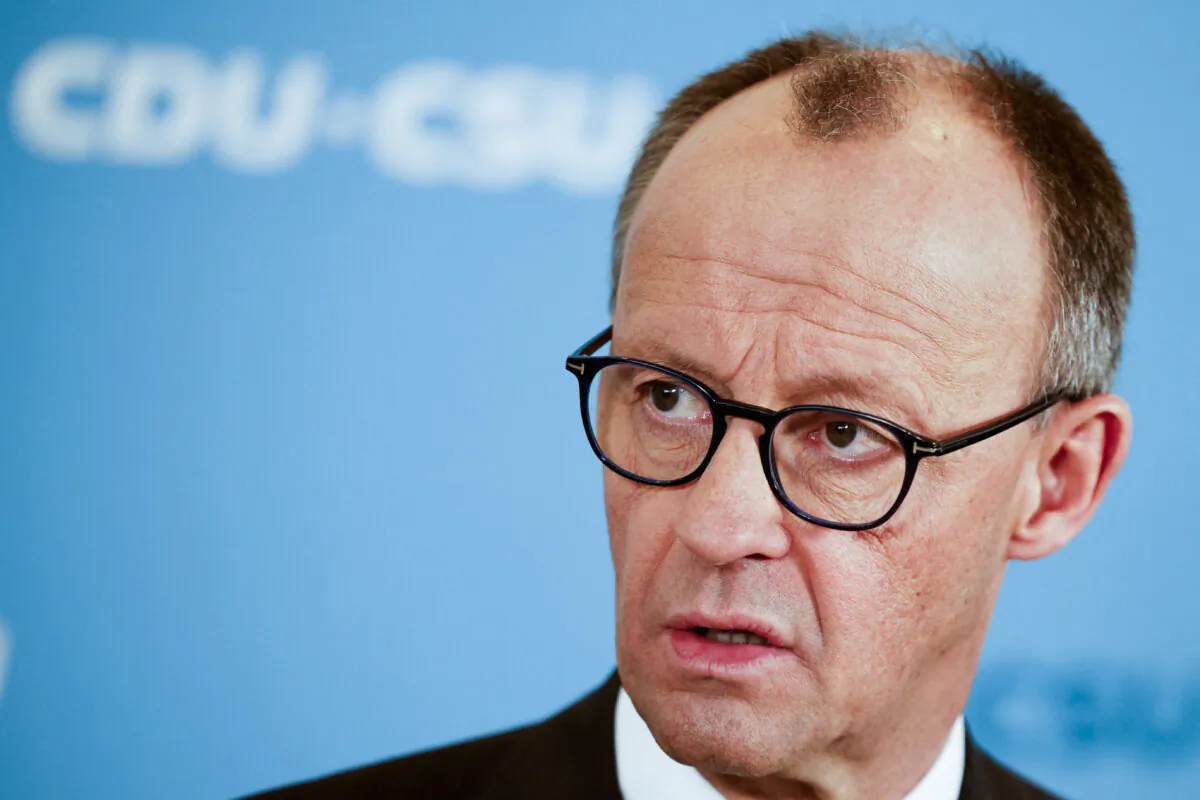 German Chancellor-in-waiting Friedrich Merz speaks to the media in Berlin, Germany, on March 14, 2025. (Axel Schmidt/Reuters) 