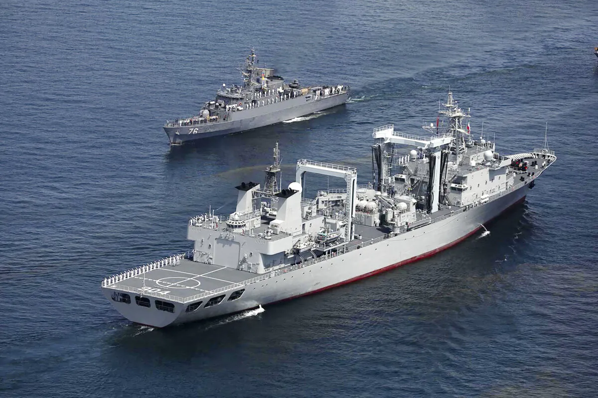 Navy vessels taking part in a joint Iranian–Russian–Chinese military drill in the Gulf of Oman on March 12, 2025. (Iranian Army Office/AFP via Getty Images)