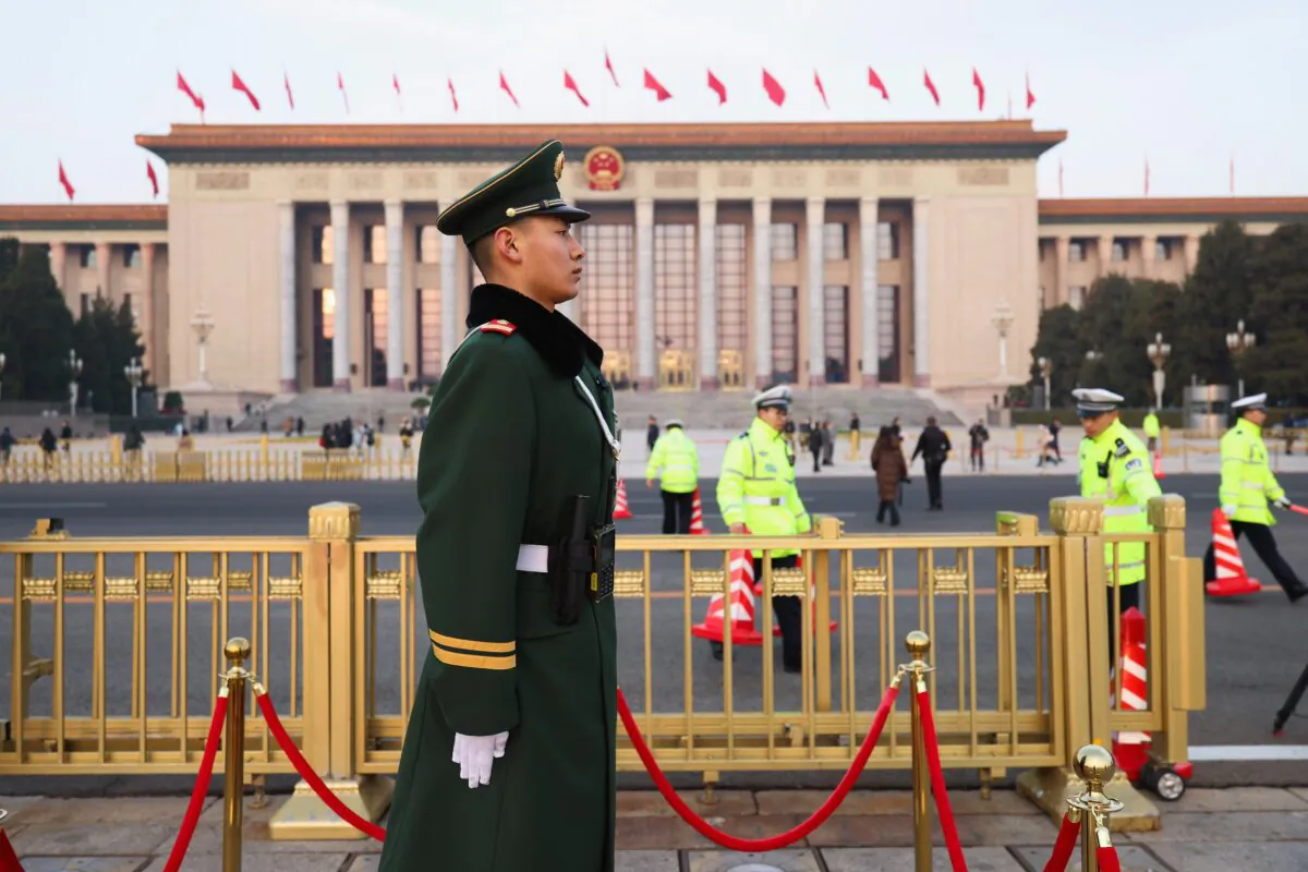 Armed policemen patrol during the opening session of China's rubber-stamp legislature, the National People's Congress, at the Great Hall of the People in Beijing on March 5, 2025. (Lintao Zhang/Getty Images)