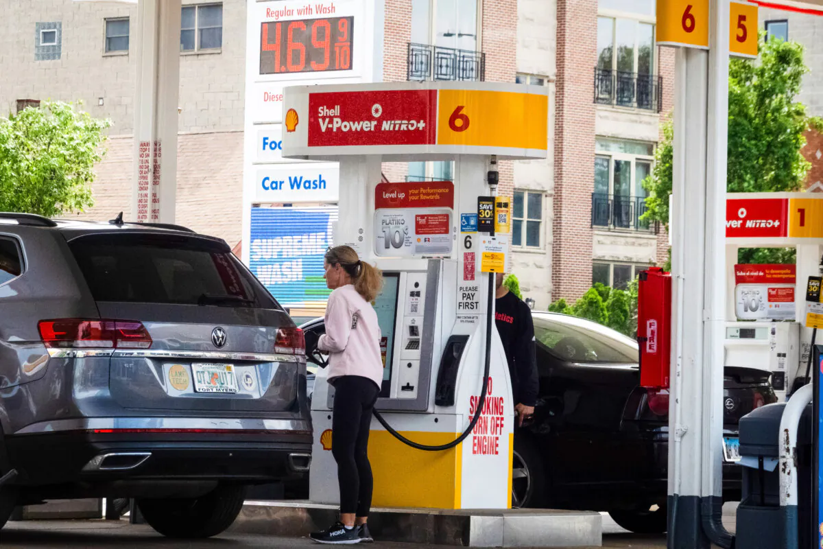 A sign displays gas prices at a gas station in Chicago on May 21, 2024. (Scott Olson/Getty Images)
