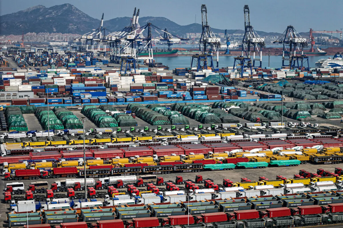Cars and other vehicles for export sit at a port in Yantai, Shandong Province, China, on April 3, 2025. (STR/AFP via Getty Images)