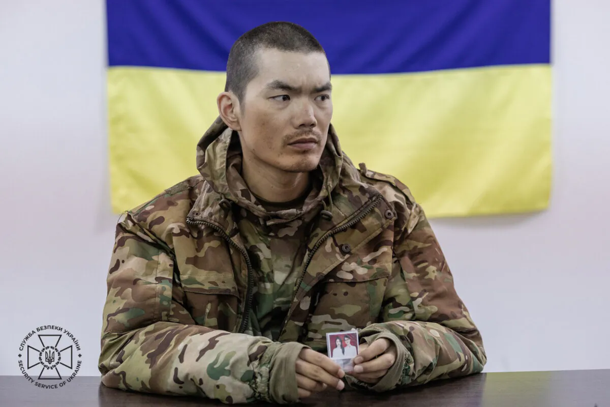 One of the two Chinese nationals captured by Ukraine after fighting for the Russian military in a photo published April 9, 2025. (Security Service of Ukraine)