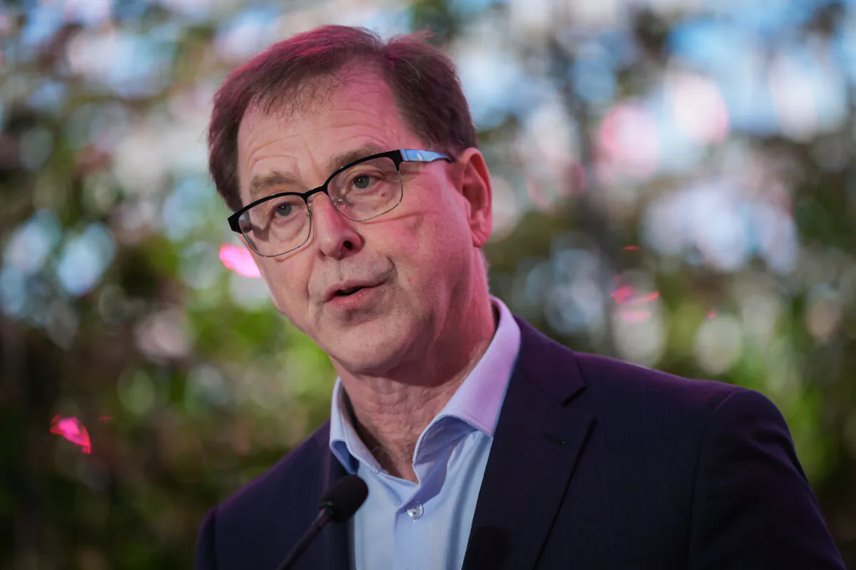B.C. Minister of Energy and Climate Solutions Adrian Dix speaks before touring greenhouses at Windset Farms, in Delta, B.C., on Jan. 24, 2025. (The Canadian Press/Darryl Dyck)