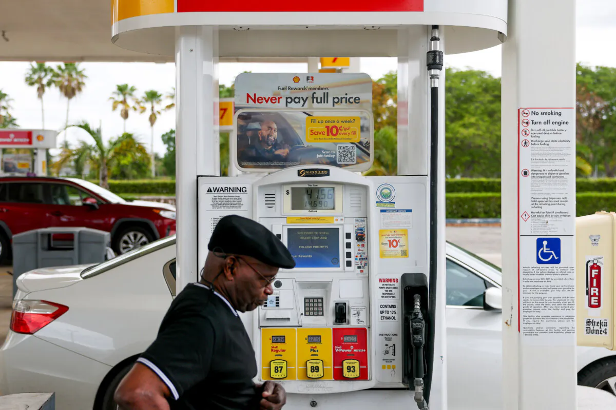Patrick Patterson walks to his vehicle after pumping gas at a Shell station in Miami, Fla., on April 10, 2025. (Joe Raedle/Getty Images)