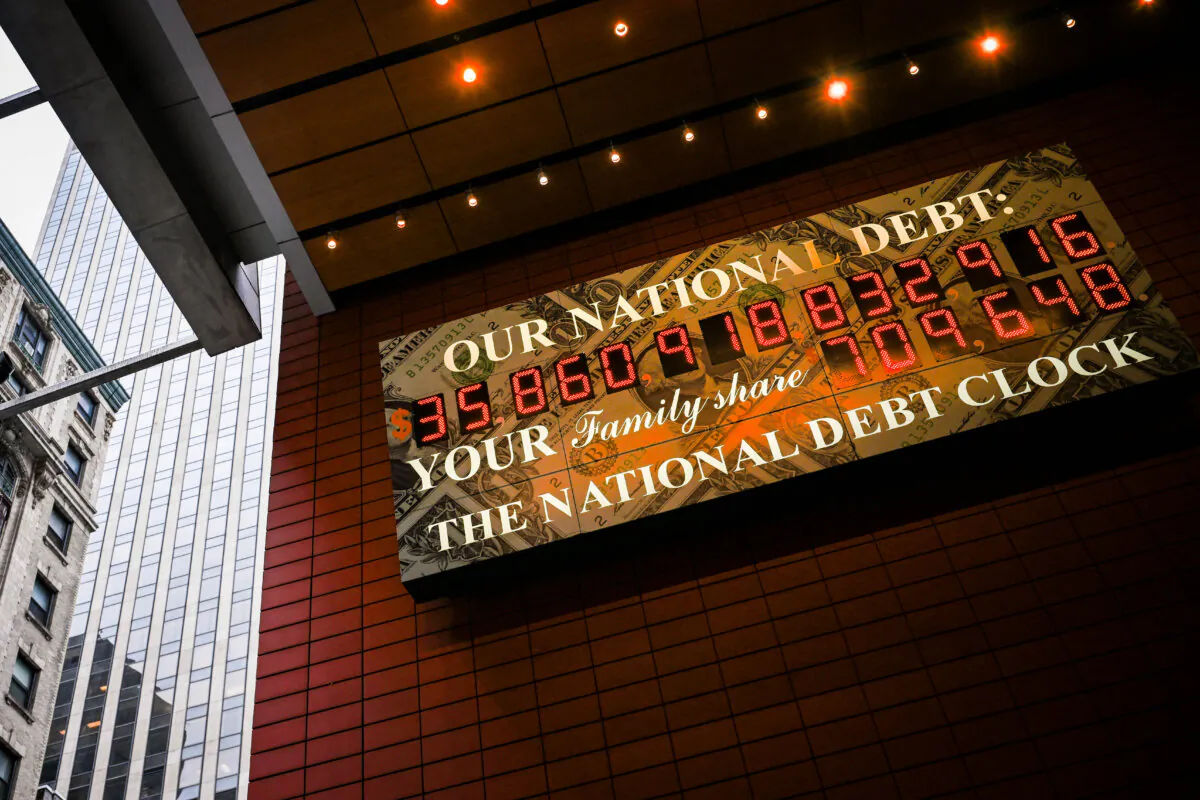 A screen displaying the U.S. national debt is seen in Manhattan on April 11, 2025. (Angela Weiss/AFP via Getty Images)