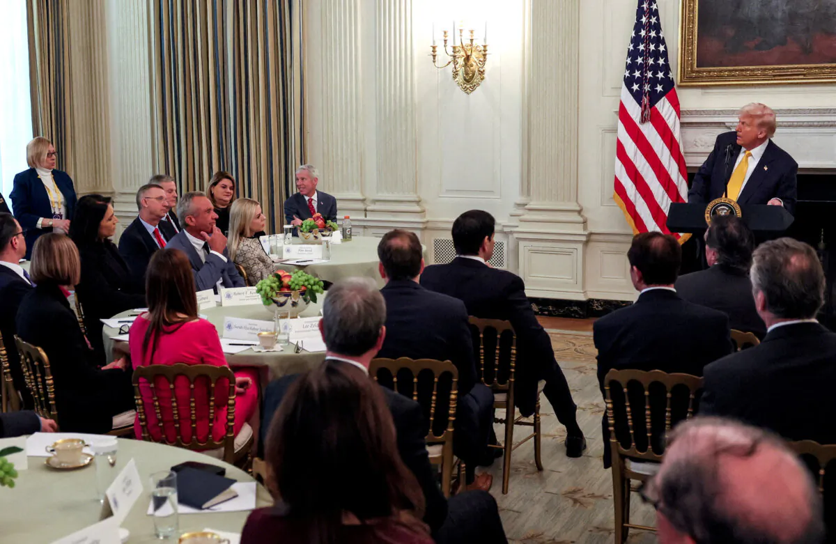 Maine Gov. Janet Mills stands as President Donald Trump speaks during a business session with governors in town for the National Governors Association's annual winter meeting, at the White House on Feb. 21, 2025. (Leah Millis/Reuters)