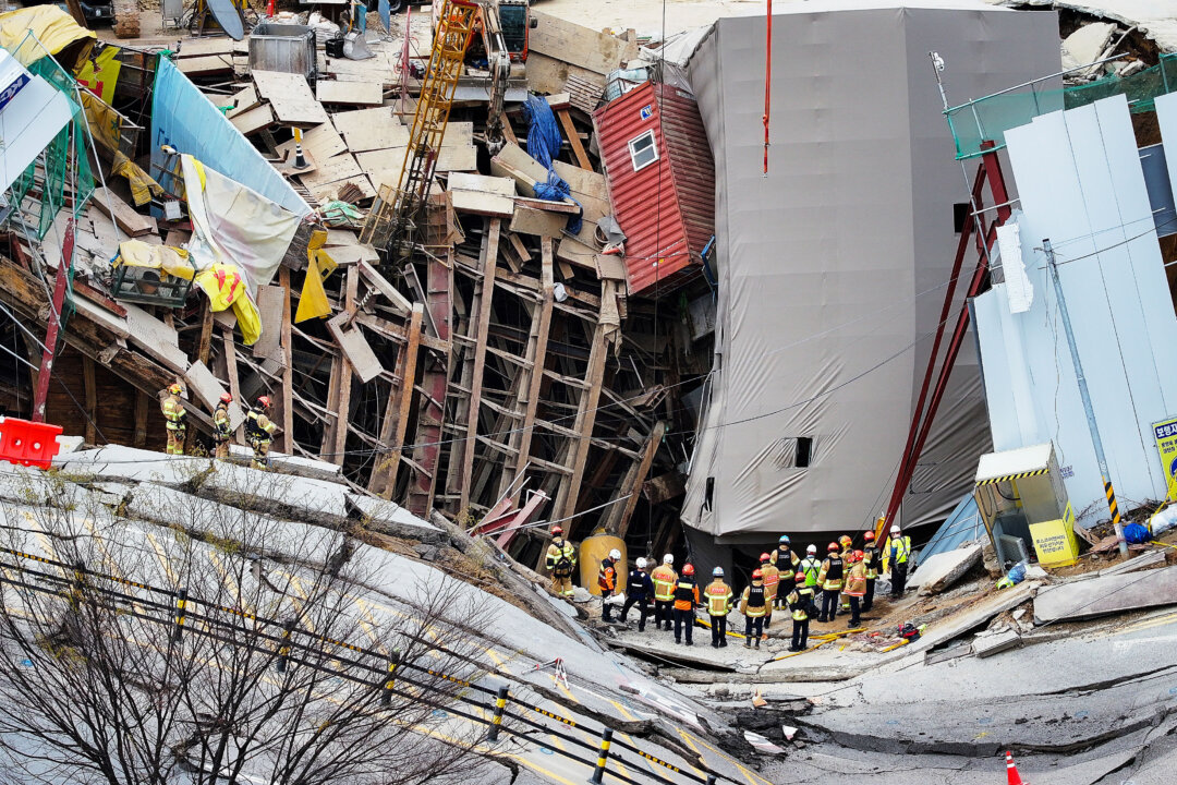 Day in Photos: Collapsed Metro Construction, Anniversary of The King’s Coronation, and Mass Water Fights