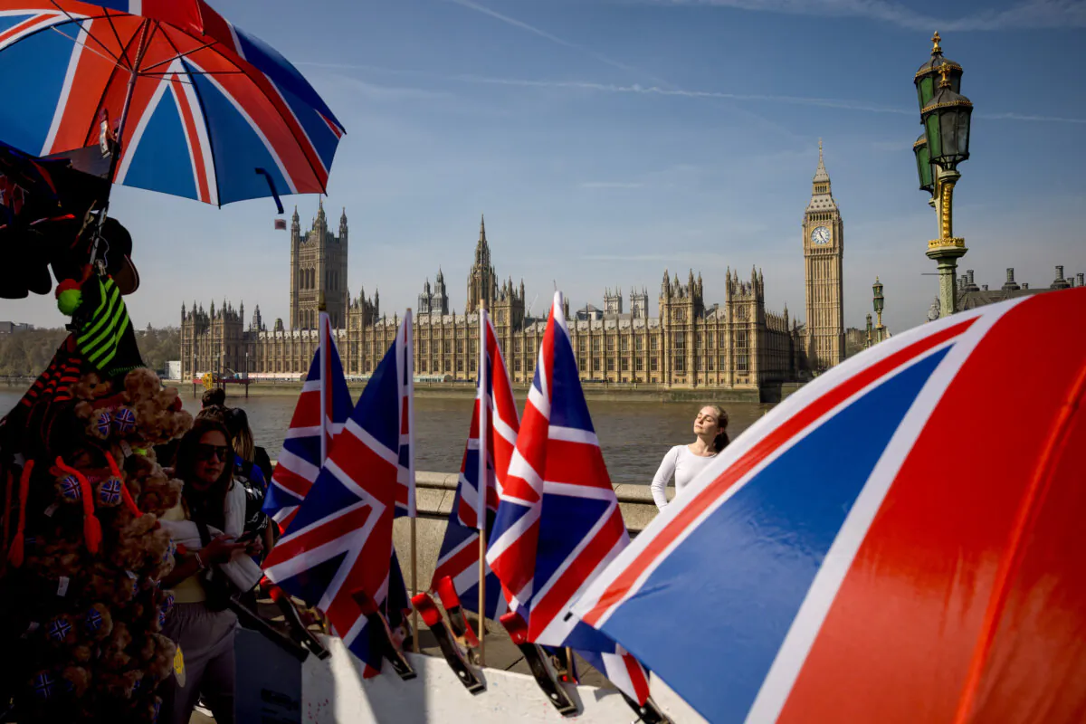 Union Jack flags are displayed at a souvenir stall opposite the Houses of Parliament in London on April 12, 2025. (Jack Taylor/Getty Images)