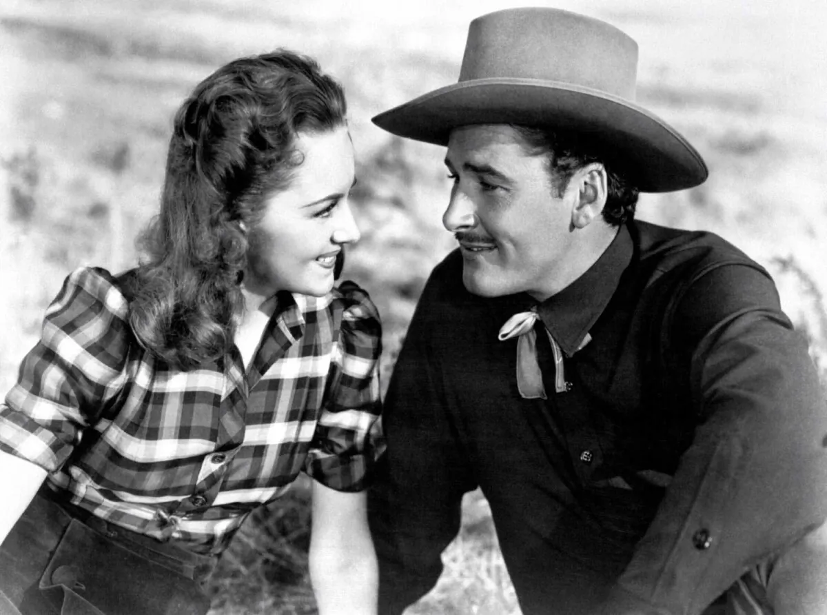 Olivia de Havilland and Errol Flynn star in "Dodge City," one of the eight films the pair made together. (Warner Bros. Pictures/MovieStillsDb)