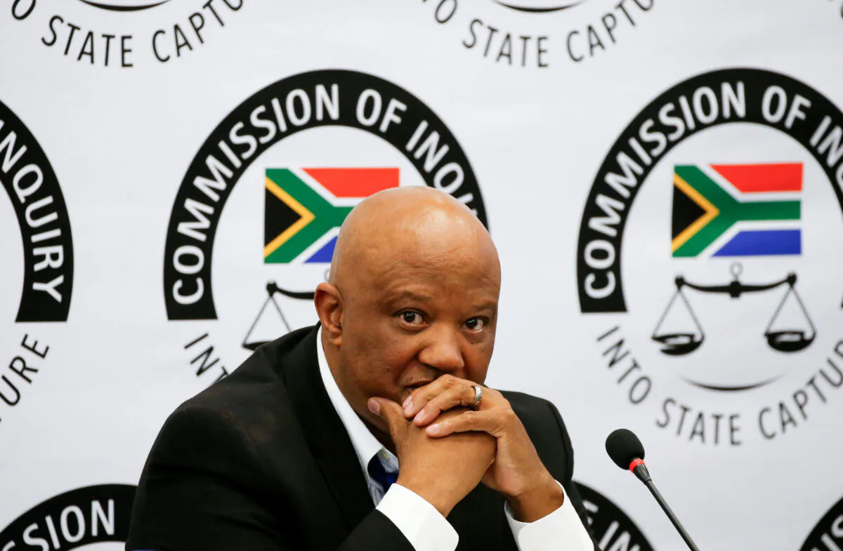 Former South African Deputy Finance Minister Mcebisi Jonas gestures ahead of the Judicial Commission of Inquiry probing state capture in Johannesburg on Aug. 24, 2018. (Reuters/Siphiwe Sibeko)