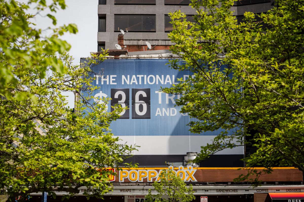 The national debt clock in Washington on April 14, 2025. (Madalina Vasiliu/The Epoch Times)