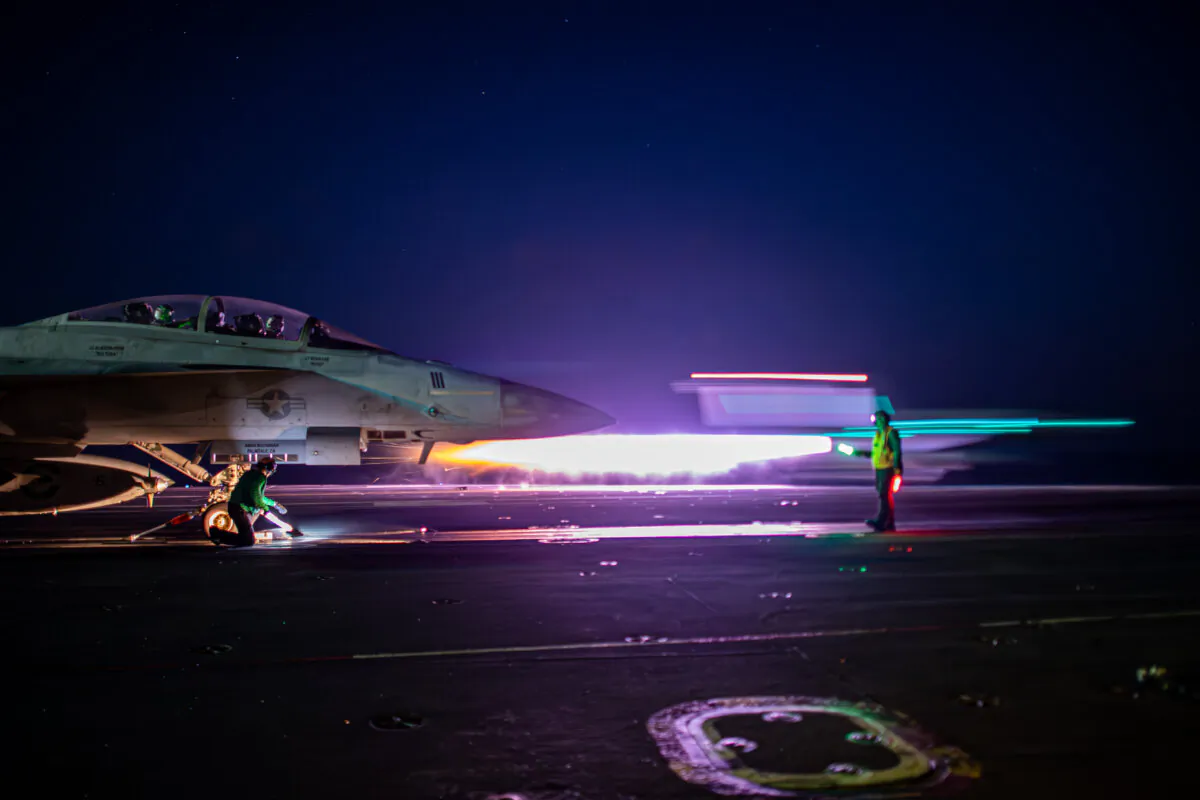 An F/A-18E Super Hornet, attached to Strike Fighter Squadron (VAW) 2, prepares to launch from the flight deck of the Nimitz-class aircraft carrier USS Carl Vinson (CVN 70) in the U.S. Central Command area of responsibility on April 12, 2025. (U.S. Navy)