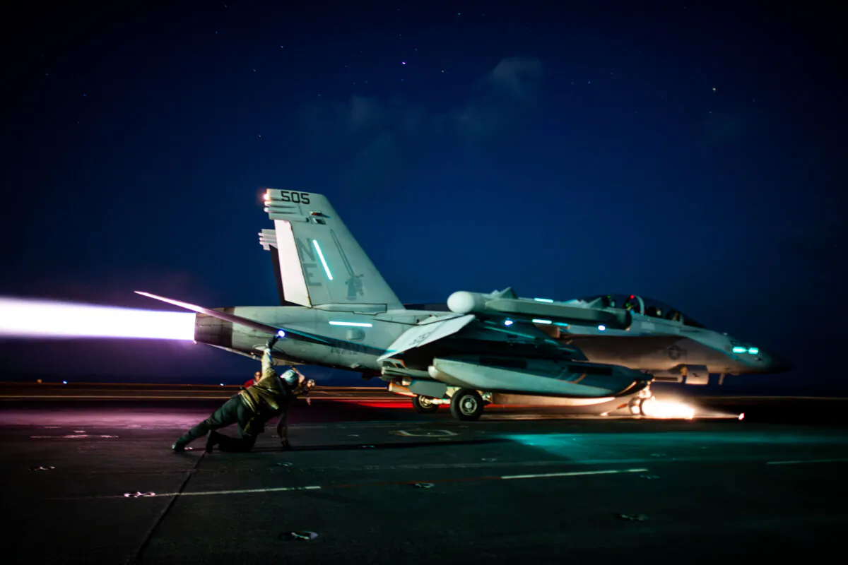 An EA-18G Growler, attached to Electronic Attack Squadron (VAQ) 136, launches from the flight deck of the Nimitz-class aircraft carrier USS Carl Vinson (CVN 70) in the U.S. Central Command area of responsibility on April 12, 2025. (U.S. Navy)