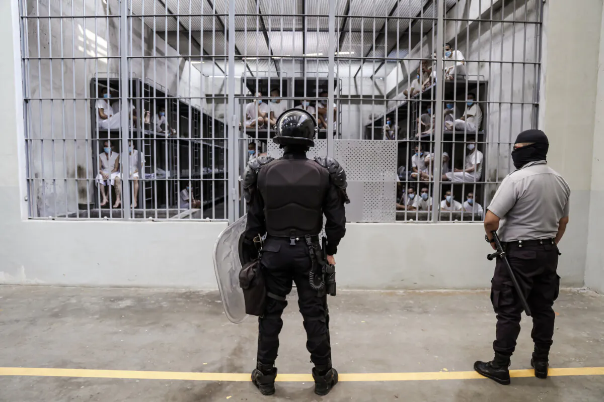 Guards stand outside a cell block at the Center for Terrorism Confinement (CECOT) in Tecoluca, El Salvador, on April 4, 2025. (Alex Peña/Getty Images)