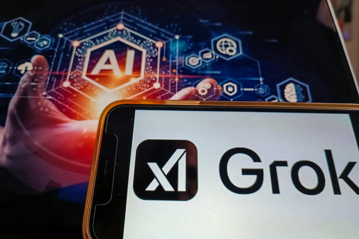 The logos for Grok and xAI are shown on a smartphone, in this file photo. (Riccardo Milani/Hans Lucas/AFP via Getty Images)
