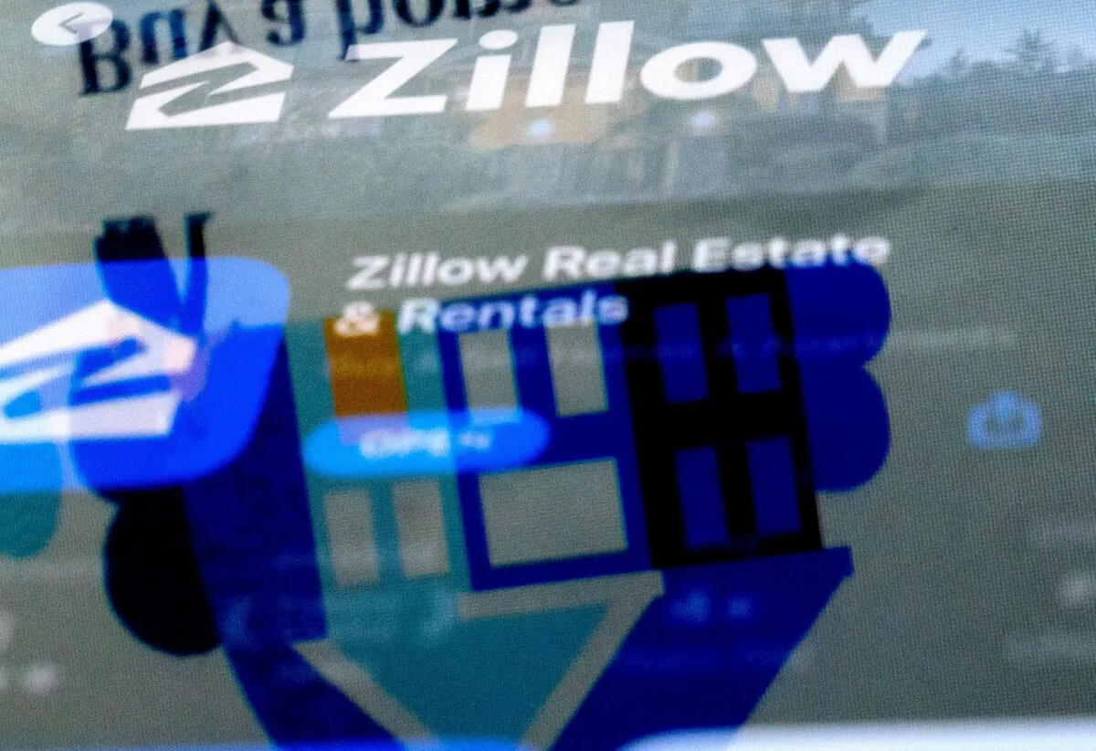 This photo illustration shows the Zillow website reflected in the logo of the Zillow app, in Washington, D.C., on Feb. 15, 2023. (Stefani Reynolds/AFP via Getty Images)