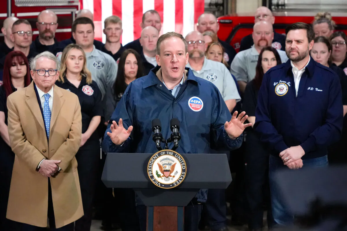 Vice President JD Vance (R) and Ohio Gov. Mike DeWine (L) listen as Environmental Protection Agency Administrator Lee Zeldin (C) speaks at the East Palestine Fire Station in East Palestine, Ohio, on Feb. 3, 2025. (Gene J. Puskar /AP Photo)