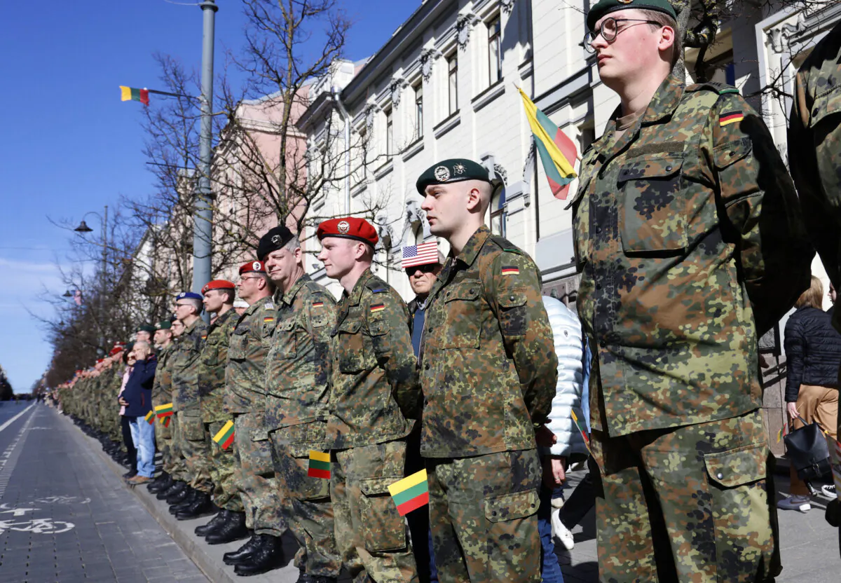German soldiers attend a ceremony to bid farewell to the U.S. soldiers who died at Pabrade military training ground, at the Cathedral Square in Vilnius, Lithuania, on April 3, 2025. (Petras Malukas/AFP via Getty Images)