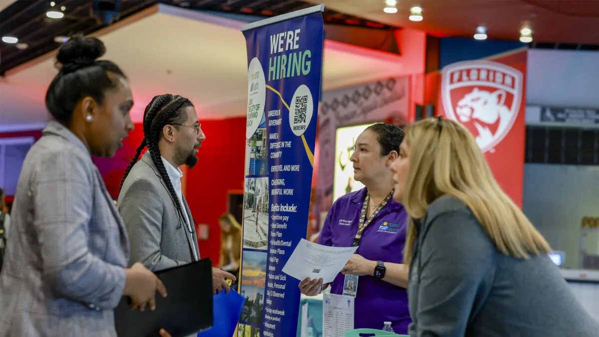 Companies look to hire new employees at a job fair in Southern Florida. (Joe Raedle/Getty Images)