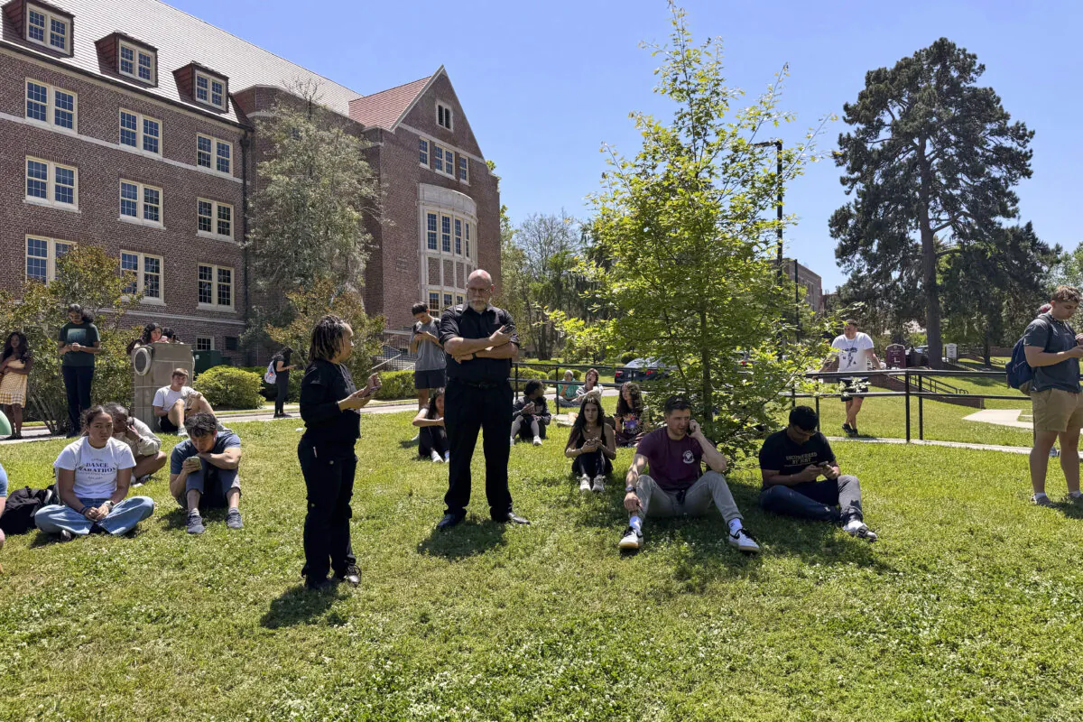 Florida State University students wait for news amid an active shooter incident at the school’s campus in Tallahassee, Fla., on April 17, 2025. (Kate Payne/AP Photo)
